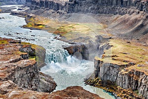 Breathtaking view of canyon and waterfall Hafragilsfoss