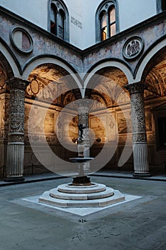 Breathtaking view of the first courtyard of the historic Palazzo Vecchio in Florence, Italy.