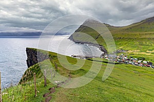 Breathtaking view of GjÃÂ³gv gorge, geo, Eysturoy island, Faroe Islands. Set in a spectacular natural setting with an ocean gorge photo