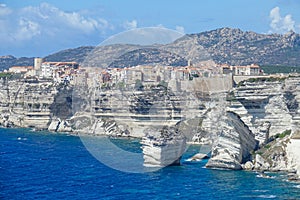 Breathtaking view of the historic city in the white cliffs above the blue ocean.