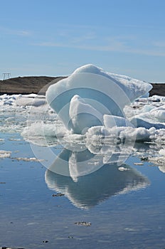 Breathtaking view of a icecap with a cool reflection in a lagoon