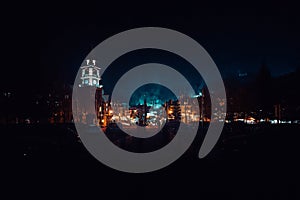 Breathtaking view of the illuminated clock tower of Montreal, Canada, against the night skyline