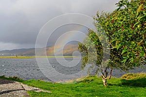 Breathtaking view of the Kyle of Lochalsh with a rainbow