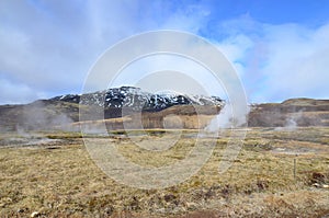 Breathtaking landscape of a steaming geysir in Iceland