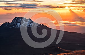 Breathtaking view of sunrise morning sky with Mawenzi mountain peak 5148m - the 4th highest peak in Africa. Kilimanjaro National