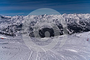 Breathtaking view from the top of the slopes to the Courchevel ski resort.