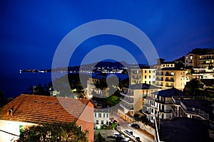 Breathtaking view from window in the night on Liguria region in Italy. Awesome villages of Zoagli, Cinque Terre and