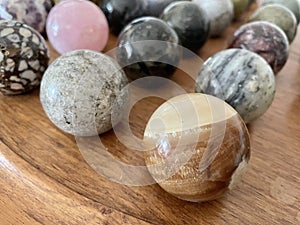 Brecciated Jasper multicolored polished crystal sphere with other various semiprecious stone balls for meditation