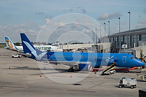 Breeze Airways Plane at a Gate at Louis Armstrong New Orleans International Airport