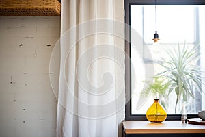 breezy linen curtains in stone window