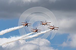 Breitling Wing Walkers Boeing Stearman Biplanes flying in formation.