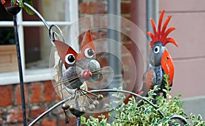 Bremen, Germany - 07/23/2015 - Decoration sculptures in medieval street Schnoor in the centre of the Hanseatic City, sunny day