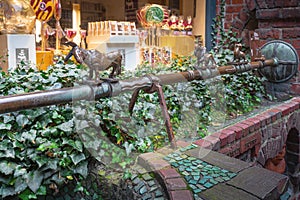 Seven Lazy Fountain (Sieben-Faulen-Brunnen) at Handwerkerhof at Bottcherstrasse Street - Bremen, Germany