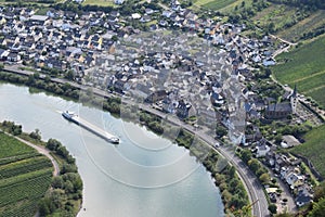 Bremm, Germany - 08 20 2020: view from Calmont to Bremm with a passing ship