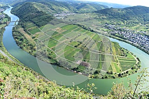 Bremm, Germany - 08 20 2020: view from the Calmont to the Mosel curve with Kloster Stuben