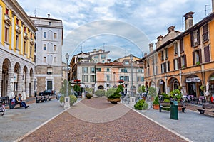 BRESCIA, ITALY, JULY 15, 2019: People are strolling on Piazza de