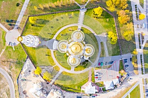 Holy Resurrection Cathedral surrounded by green spaces, aerial landscape