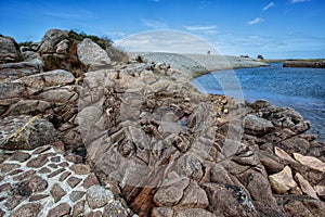 Bretonic Coast and Beach with Granite Rocks at the Cote de Granit Rose - Pink Granite Coast