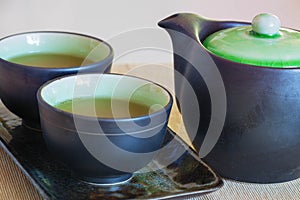 Brewed and healthy Japanese green tea served in traditional hohin and shiboridashi dishes