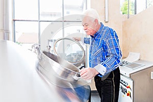 Brewer in brewhouse