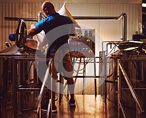 Brewer in brewhouse