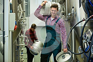 Brewer carrying keg