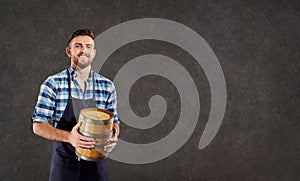 The brewer, the winemaker the munchina with a barrel in his hand