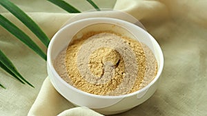 brewers yeast flakes in a bowl on table