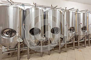 Brewery, beer tanks are covered