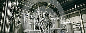 Brewery equipment, Industrial stainless steel pipes connected with tanks or vats for beer production