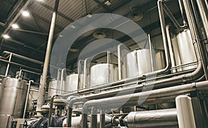 Brewery equipment, Industrial stainless steel pipes connected with tanks or vats for beer production