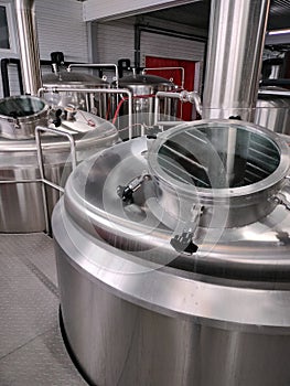 Brewery. Stainless steel tanks for brewing beer.