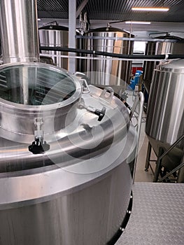 Brewery. Stainless steel tanks for brewing beer.