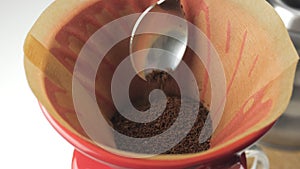 Brewing coffee in a funnel by the purover method.