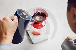 Brewing Perfect Cup: Pour Over Coffee Preparation With V60 Funnel on Kitchen Counter