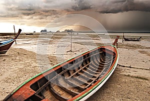 A brewing storm on an ocean sunset