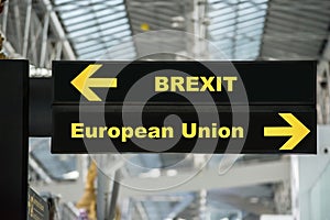 Brexit or british exit on airport sign board with blurred