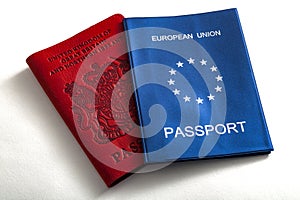 Brexit, freedom of movement and citizens rights concept with EU or european passport and UK or british passport isolated on white