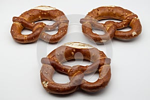 Brezel, also known as a pretzel, is a type of baked bread product often associated with German cuisine