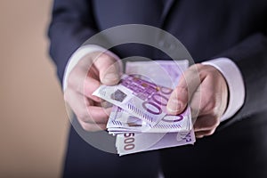 Bribe and corruption with euro banknotes.