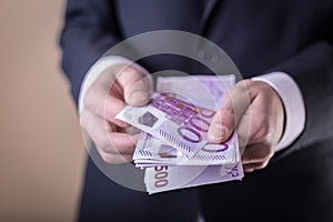 Bribe and corruption with euro banknotes. photo