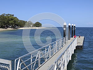 Bribie Island Jetty with two fishermen