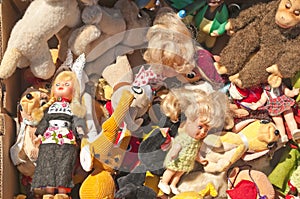 Bric-a-brac market with dolls photo