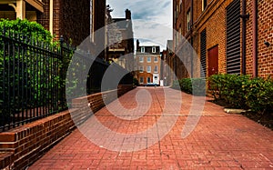 Brick alley and houses in Fells Point, Baltimore, Maryland.