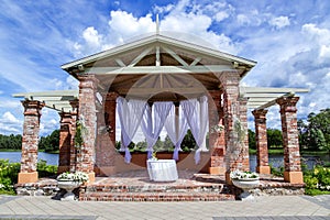 Brick arbour with white light curtains