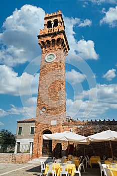 Brick bell tower of the church of San Giacomo in Murano, Venice island, Italy