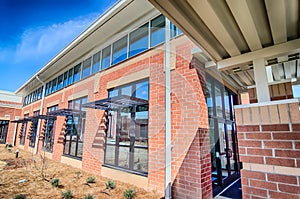 brick building architecture with suncreen shades