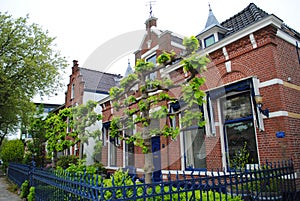 Brick building with blue trim in Delft Netherlands