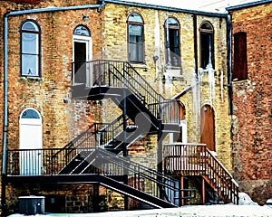 Brick Building with Stairs and Large Icicles