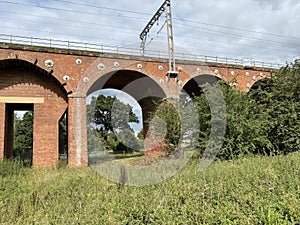 Railway viaduct, built with red brick near, Shay Lane, Walton, Wakefield, UK photo
